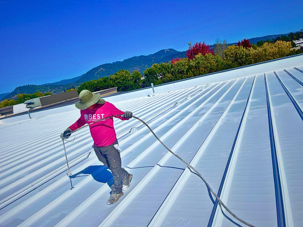 Roof restoration and silicone coating on a low-slope roof in Eugene, Oregon